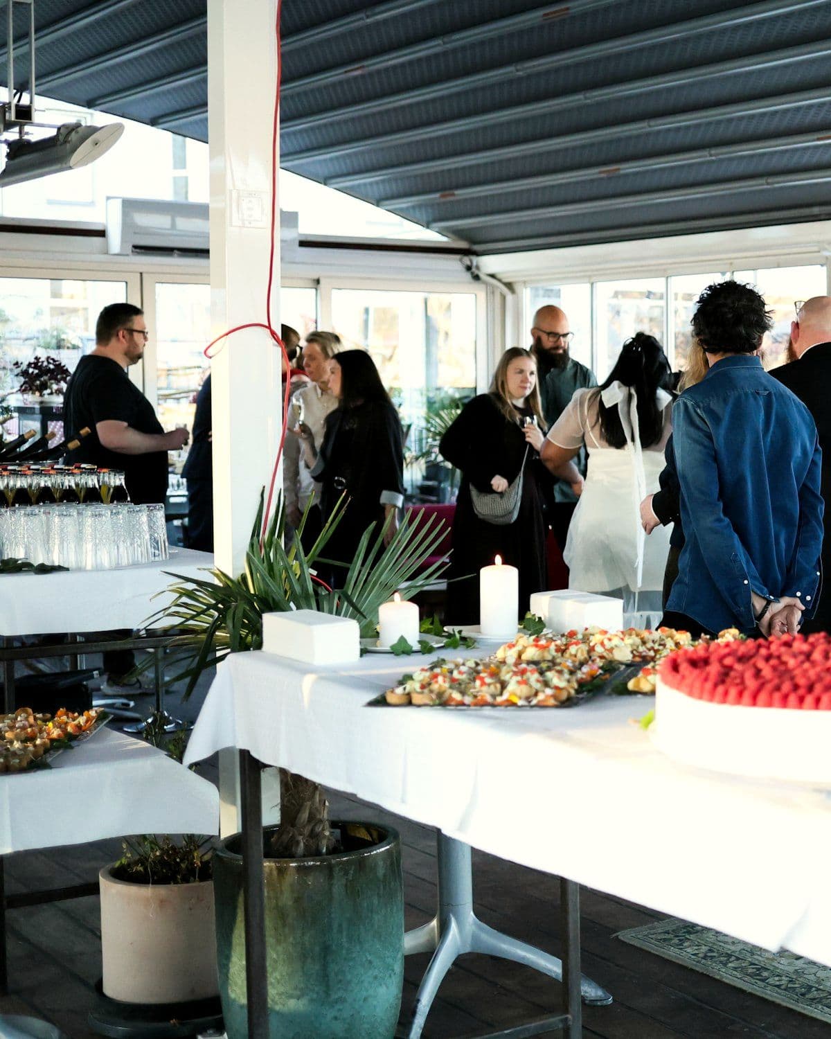 Delegates networking over refreshments at a dealer meet
