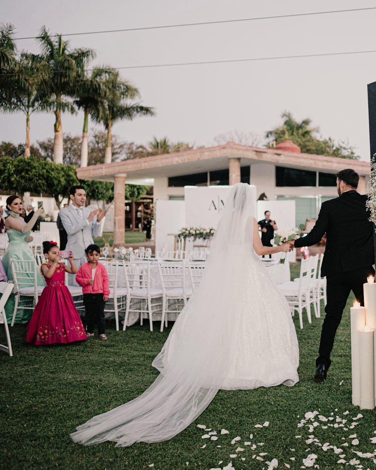 Entrance archway dressed in florals and drapery