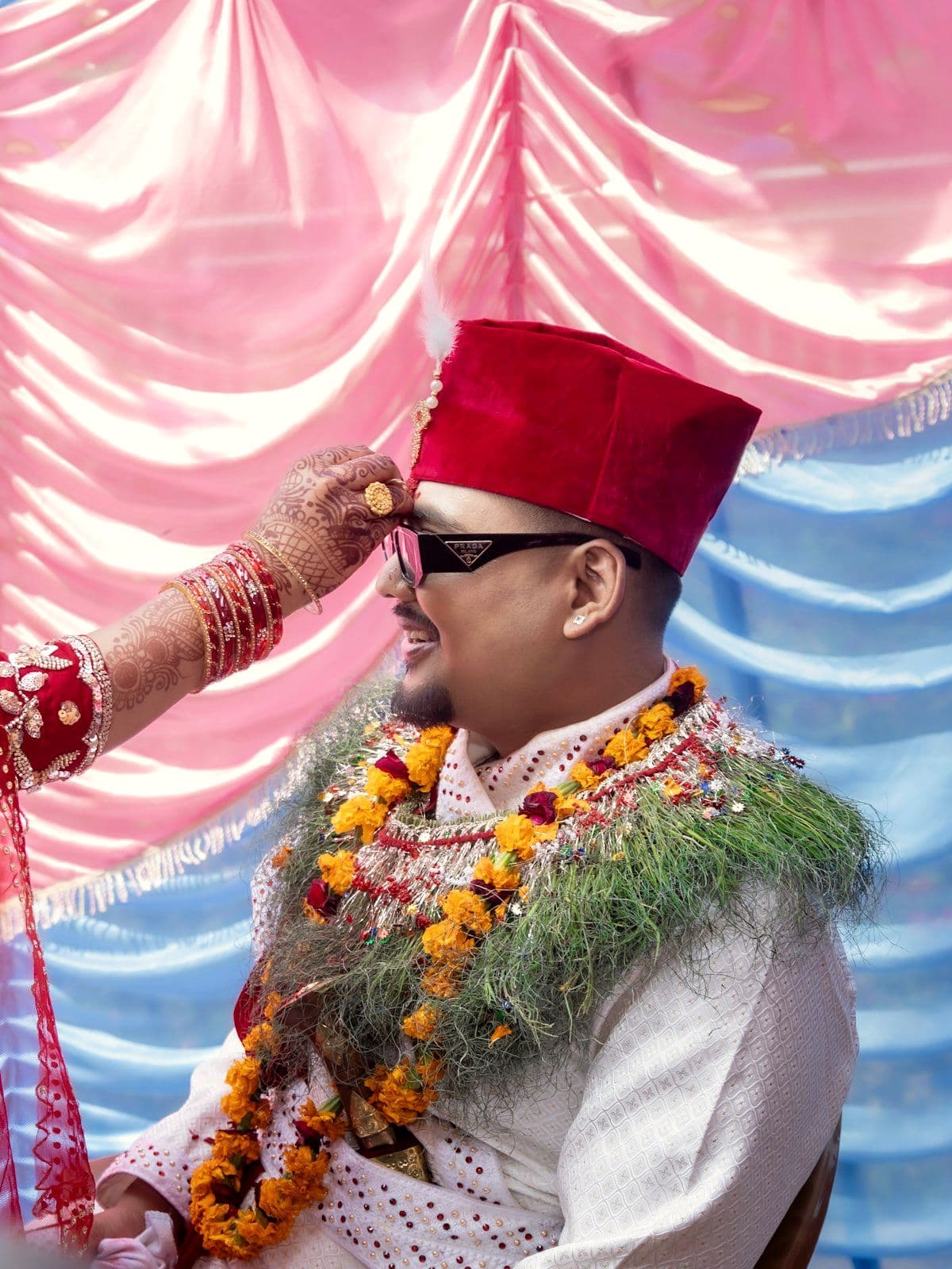 Groom in garlands during the wedding rituals