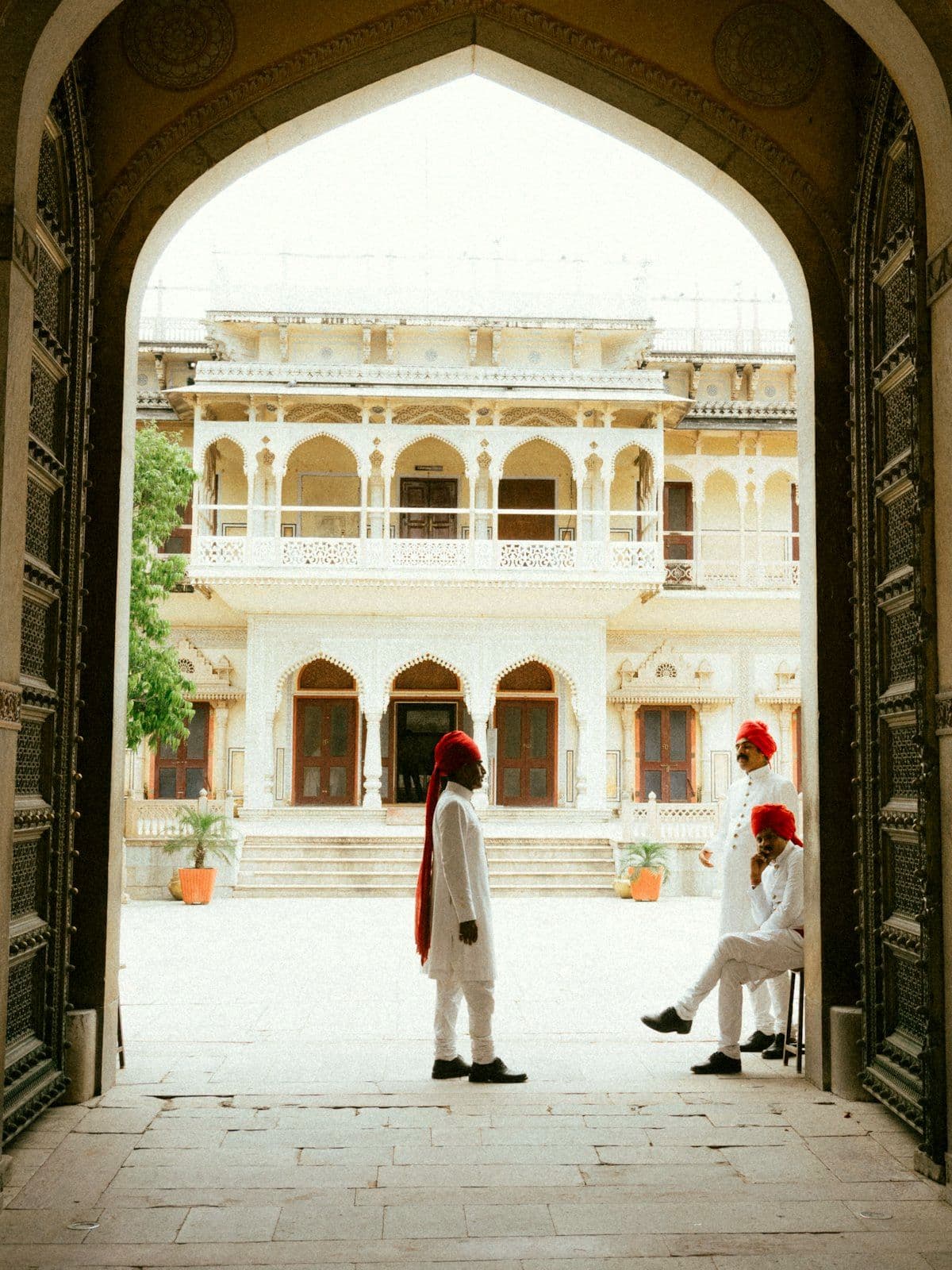 Guests in traditional attire at a heritage property