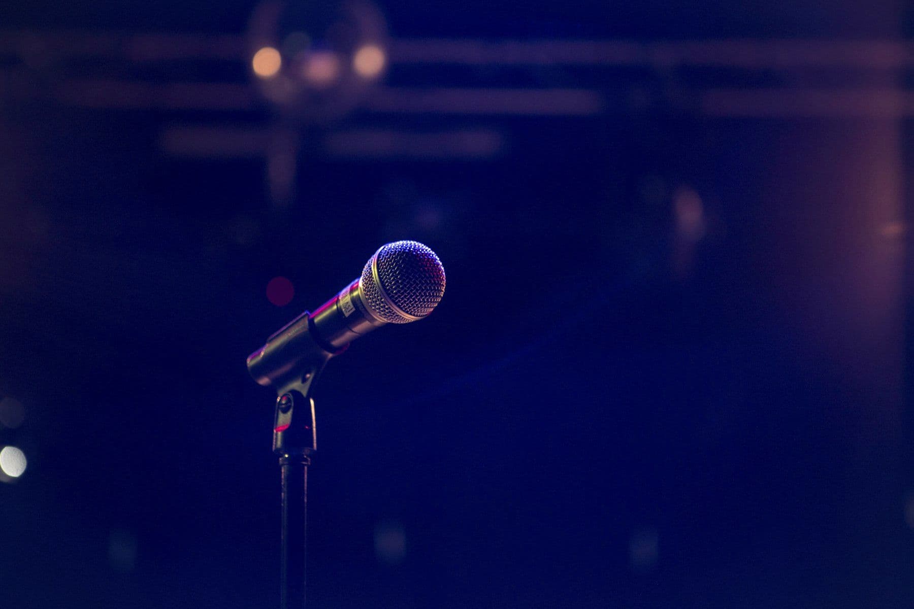 Microphone on a stand under a single stage light