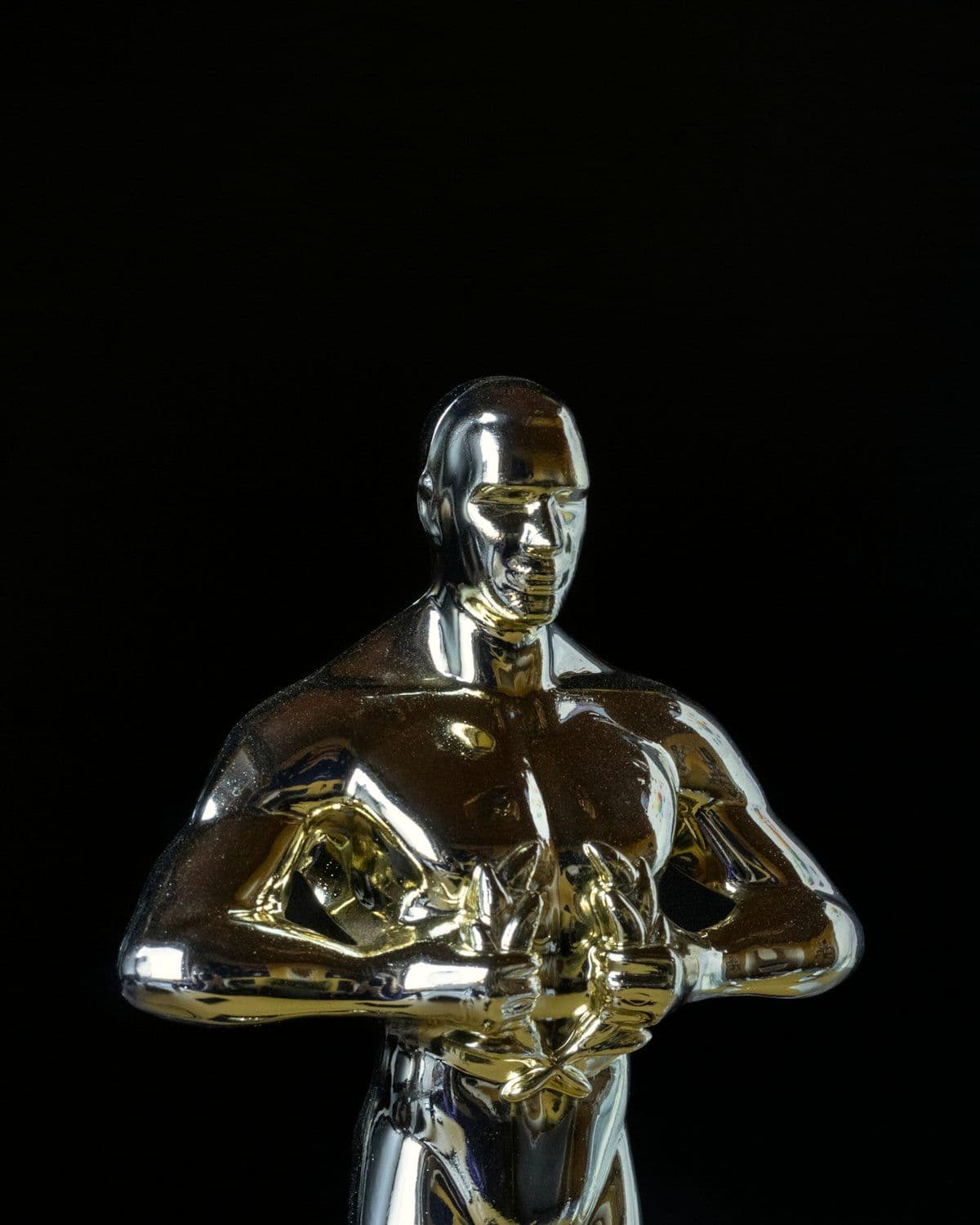 Award statuette waiting on the presentation table