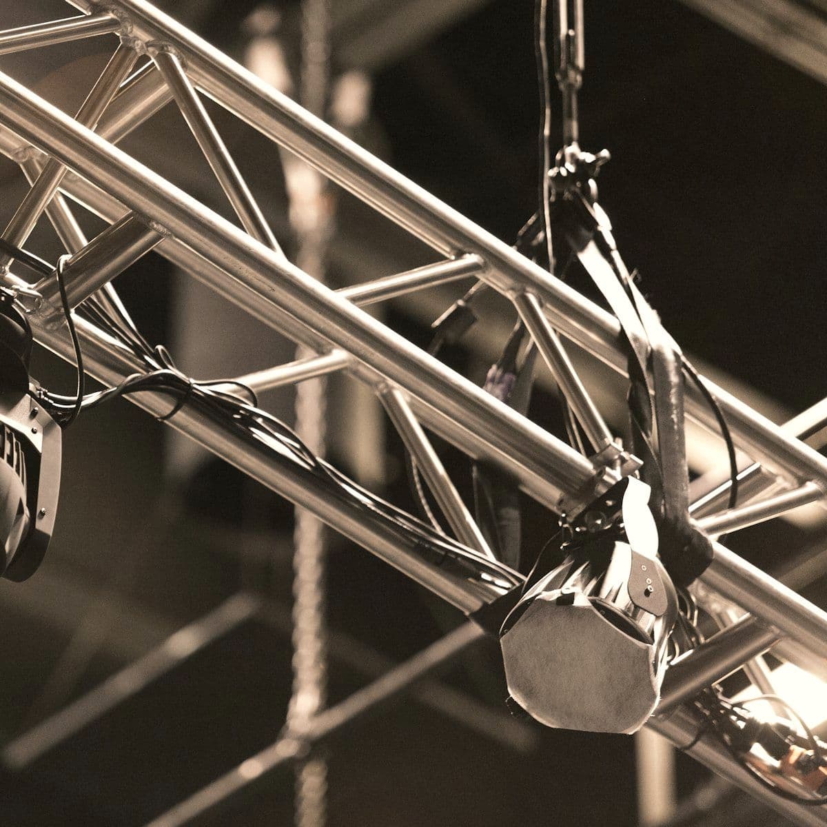 Stage lighting rigged overhead before doors open
