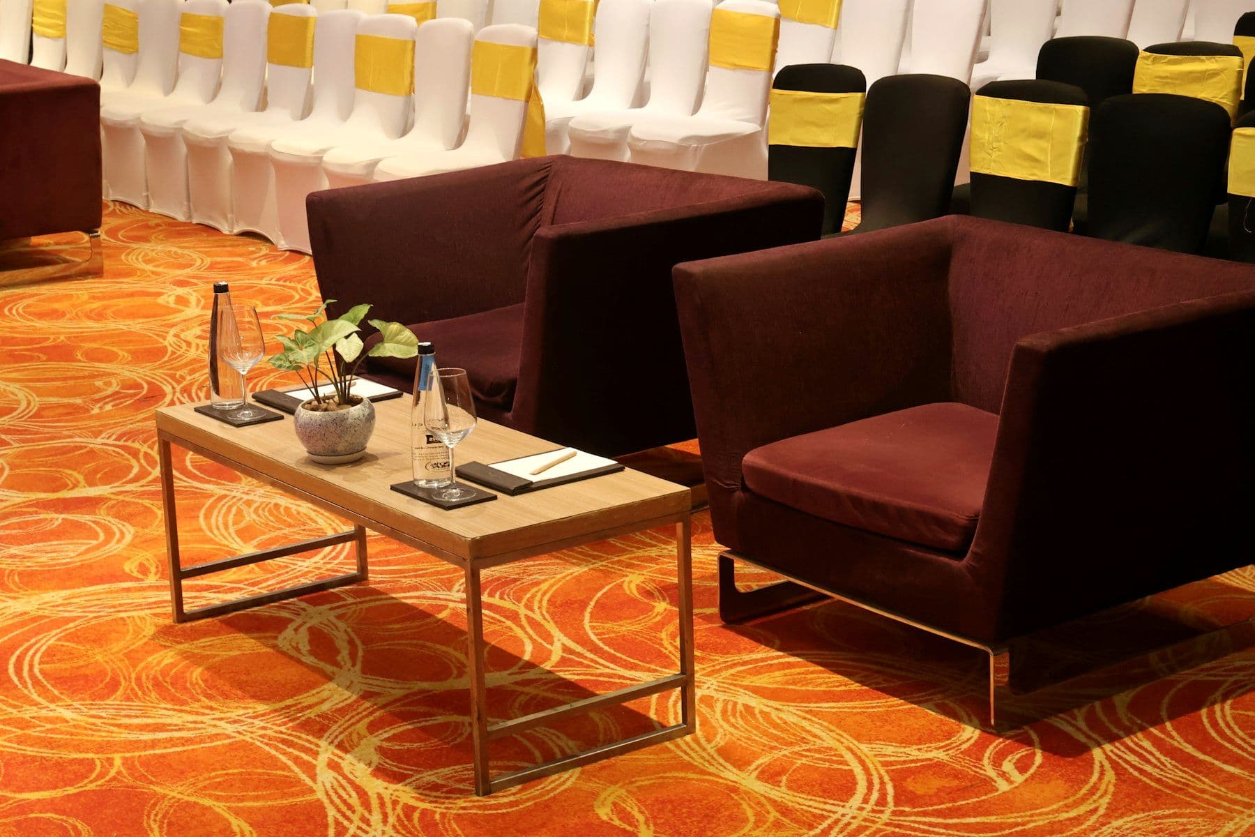 Networking lounge laid out with seating and low tables