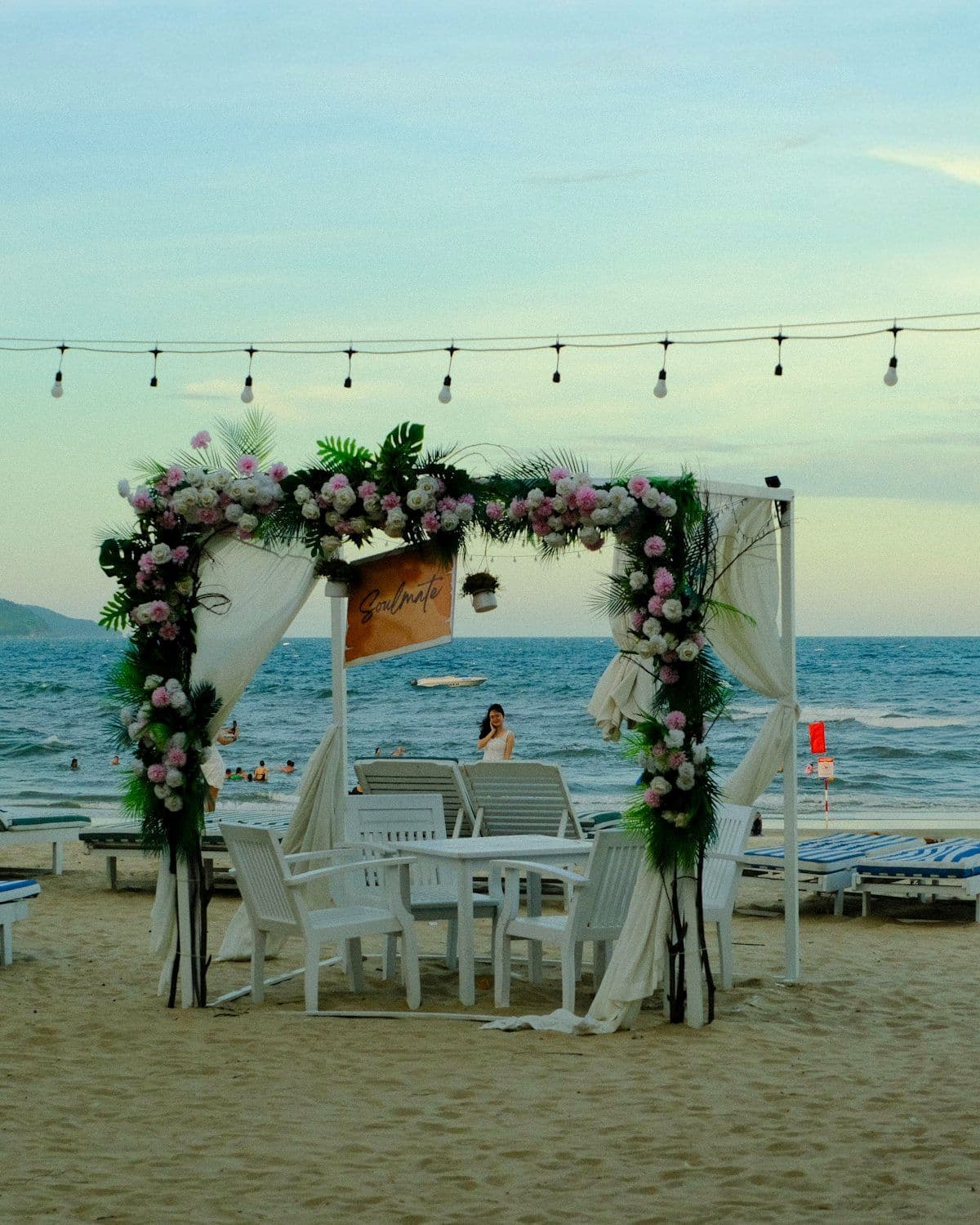 Outdoor ceremony set against an open landscape