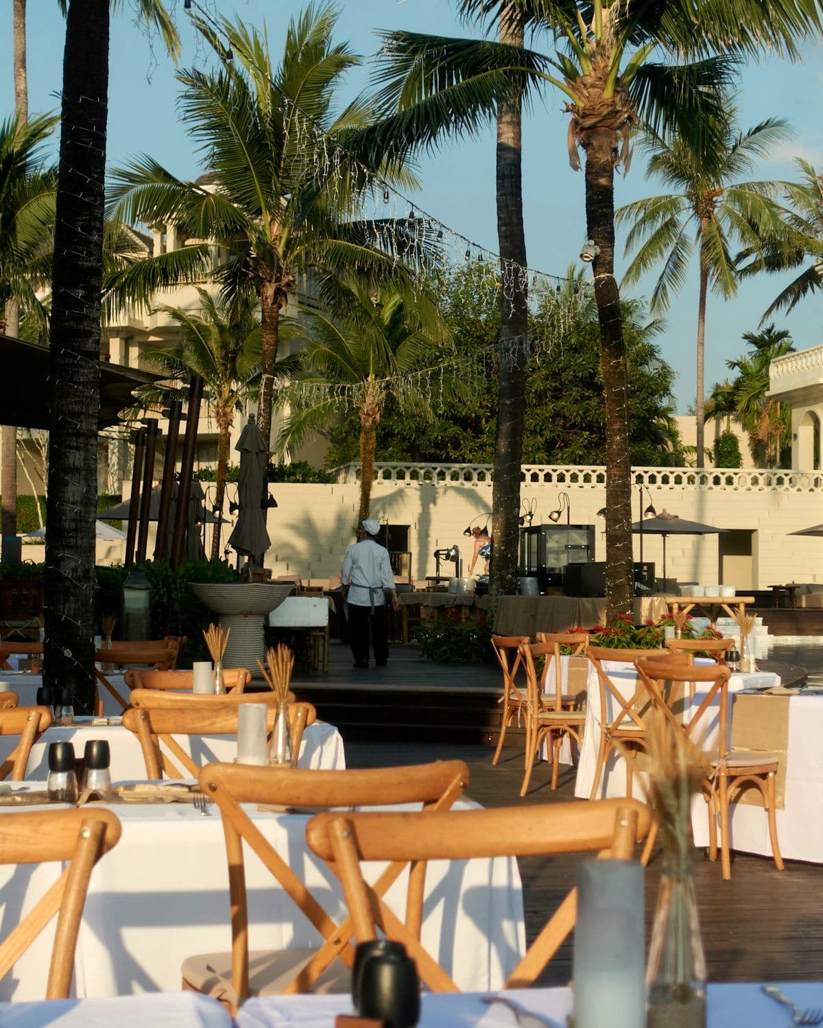 Poolside function area dressed for a daytime event