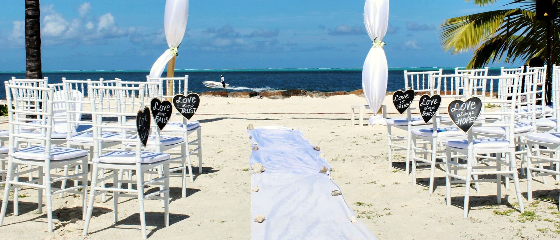 Wedding ceremony set against an open destination landscape