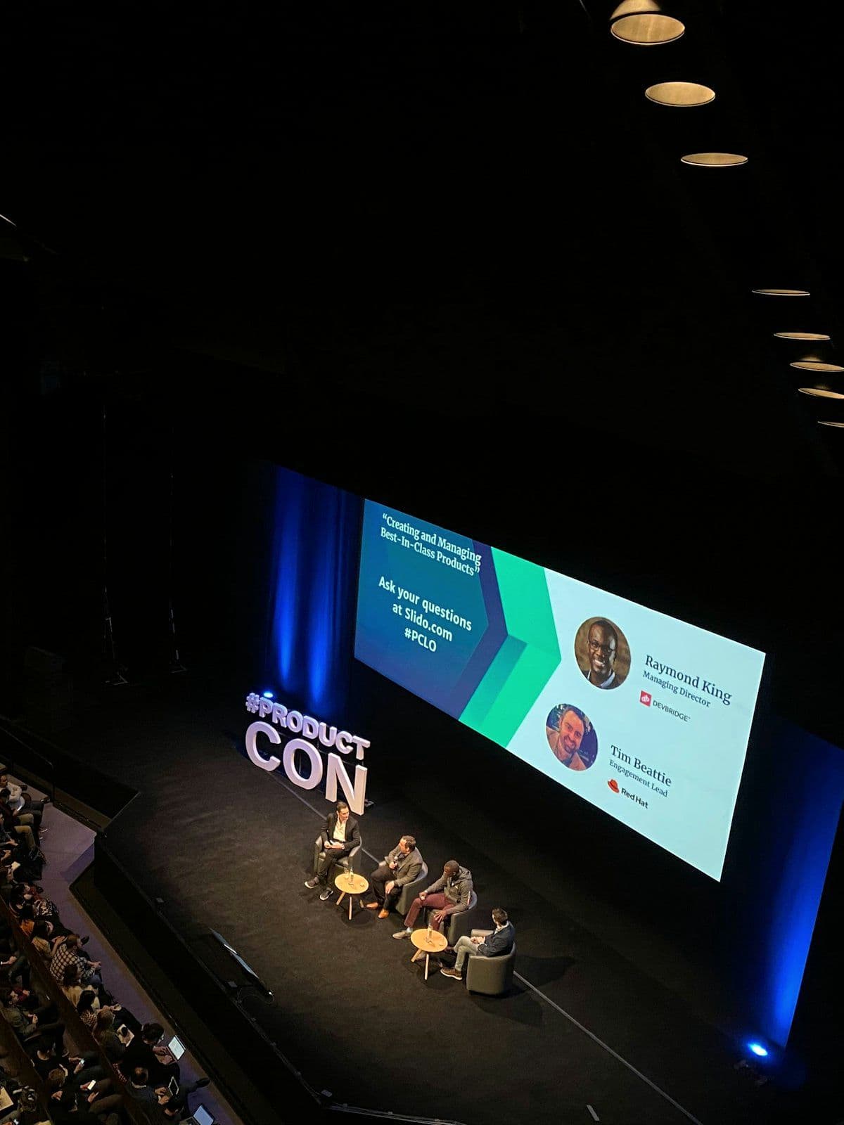 Plenary session with a speaker on a produced stage