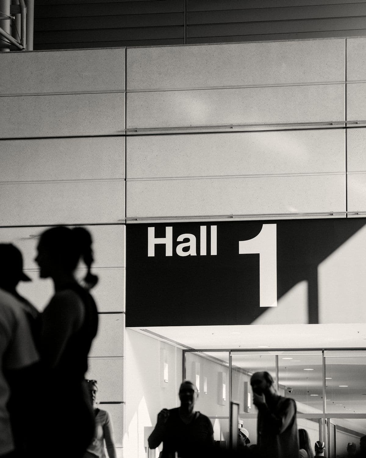 Delegates entering an exhibition hall