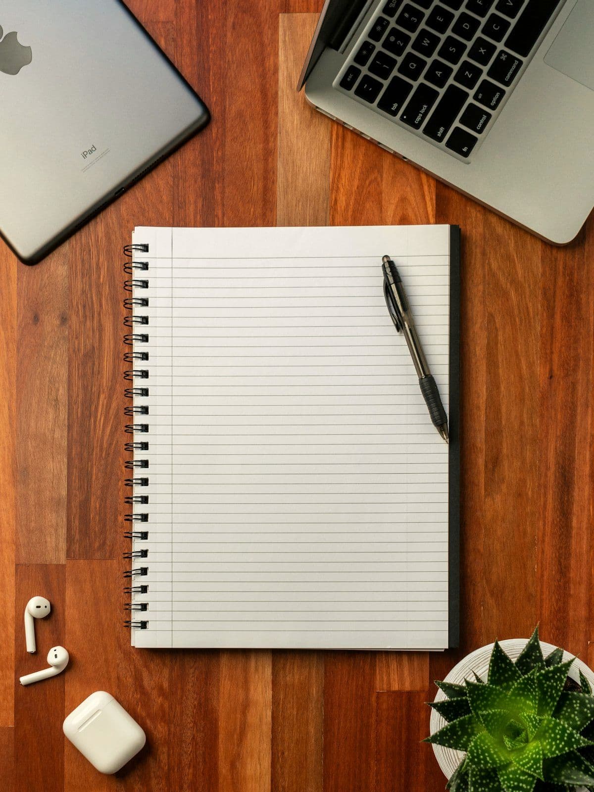 Planner marking up notes during a site visit