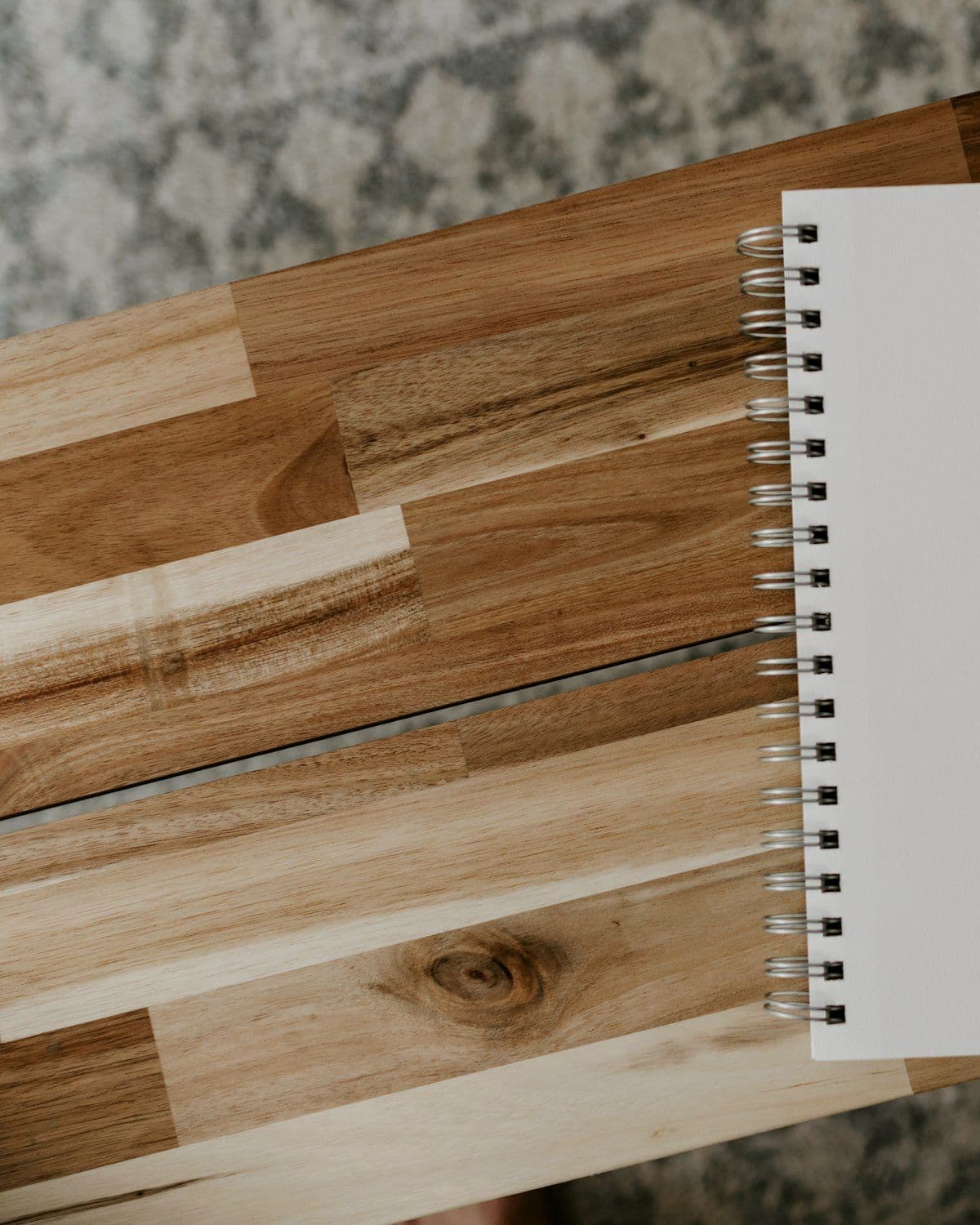 Notebook and planning notes open on a desk