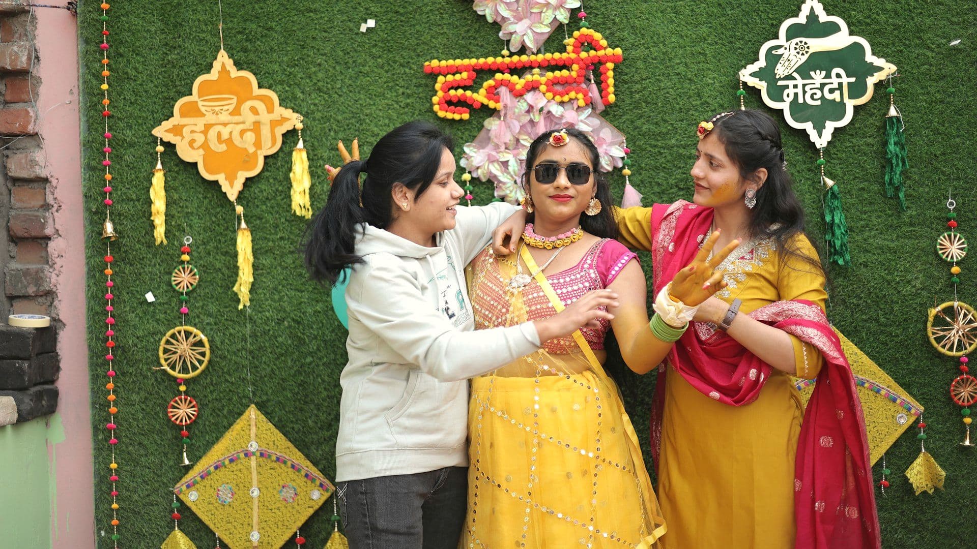 Guests celebrating together at a haldi ceremony